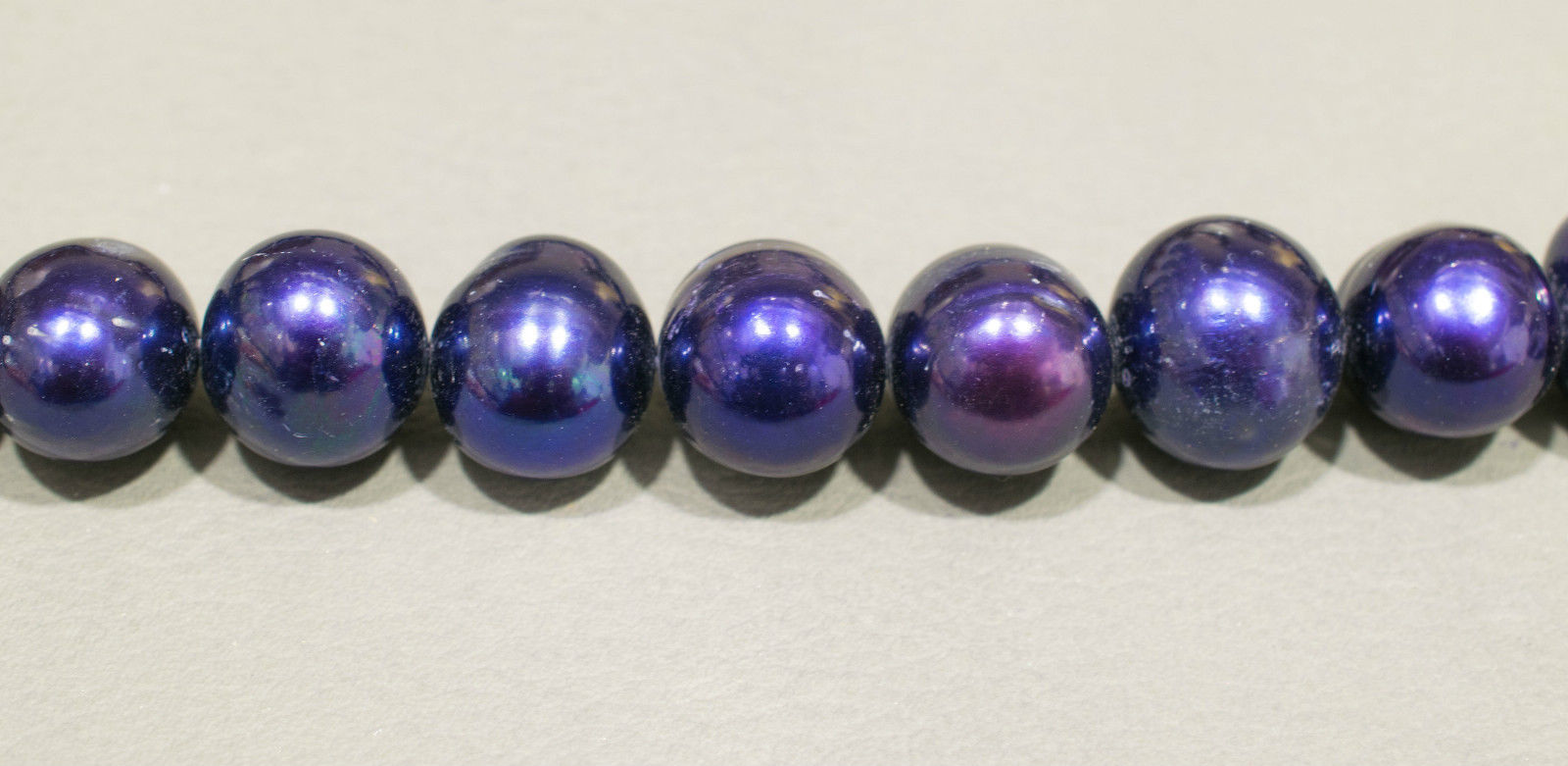 Perlenstrang Dunkelblau rund mit hohem Lüster in 14-15 mm